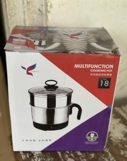 Mini rice cooker with strainer